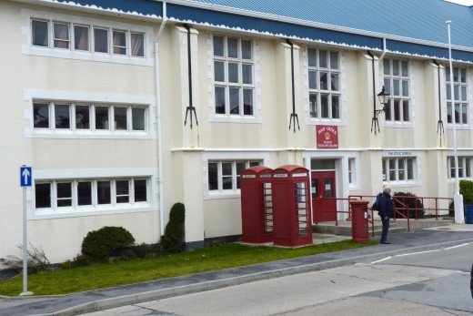 Post Office in Stanley with British telephone booths that still work