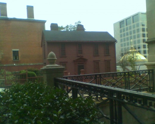Variety of Architecture: Old house near a golden dome
