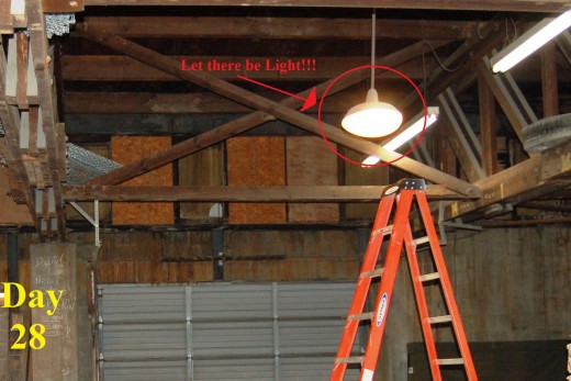 Since I've halfway conquered my extreme fear of heights, I decided that I would climb the big boy ladder to change a light bulb that hasn't functioned since I began working here (3 and a half years ago).