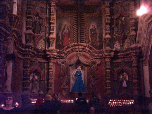 Altar in Chapel to right of Main Altar in the 18th Century Mission Church of San Xavier del Bac in Tucson, AZ