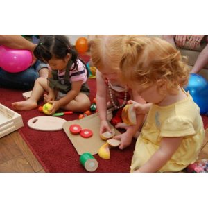Toddlers love playing with pretend food.