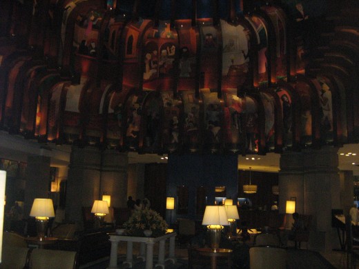 Lobby of Maurya Sherton Hotel in Delhi - excellent work of art on the walls and ceilings.