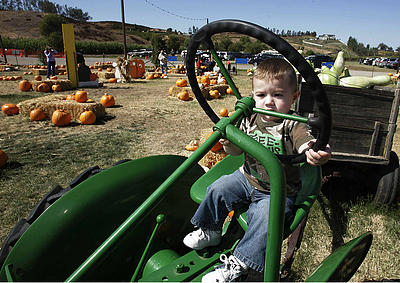 A great place to take pictures on a real John Deere Tractor.