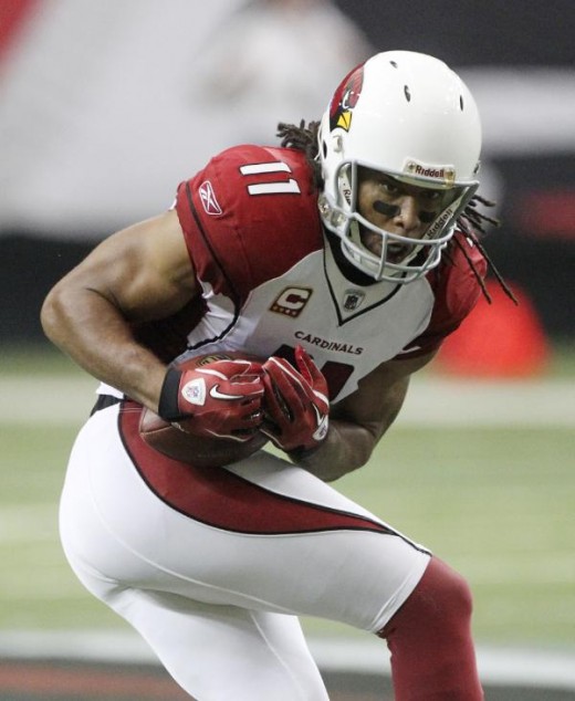 Arizona Cardinals receiver Larry Fitzgerald makes a catch during an NFL football game against the Atlanta Falcons Sunday, Sept. 19, 2010 in Atlanta. (AP Photo/John Bazemore)