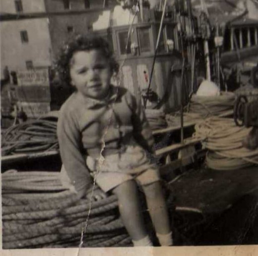 3 years old getting a free boat ride on the fishing boat with free fish after