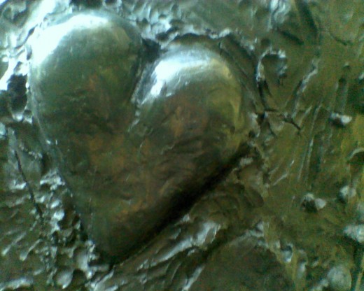 Smaller heart embedded in one of the two "Two Big Black Hearts" by Jim Dine