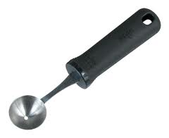 The Parisienne Scoop has a small, cup-shaped, halfspherical blade.  It cuts balls out of fruits, vegetables and butter.  It is sometimes called a melon scop or ball cutter.
