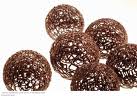 Some balls may be sprinkled with powdered sugar while slightly warm.