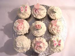 Mini-cakes or cookies iced, then decorated with glittered décor are feminine and fantastic for that special sparkling person!