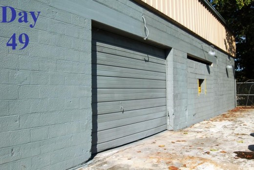 My boss and I finally got around to finishing painting the back side of the warehouse today.  Three walls down, one more to go! (I wish I would've swept before I took this picture lol)