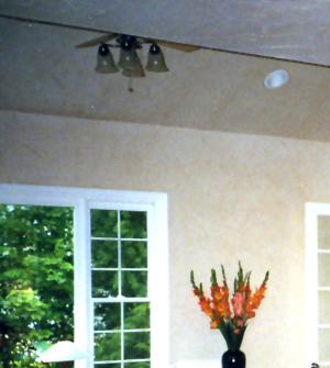 High ceilings + ceiling fan-light = drama + comfort.
