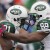 New York Jets running back LaDainian Tomlison (21) reacts with teammate Jerricho Cotchery after scoring a touchdown against the Buffalo Bills during the second half of an NFL football game in Orchard Park, N.Y., Sunday, Oct. 3, 2010. The Jets won, 38