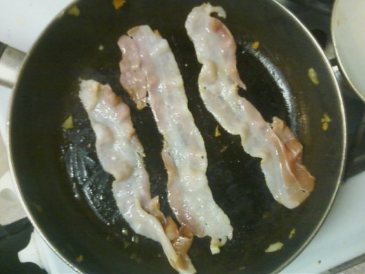 Cook the bacon.