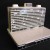 Miniature building on laptop computer