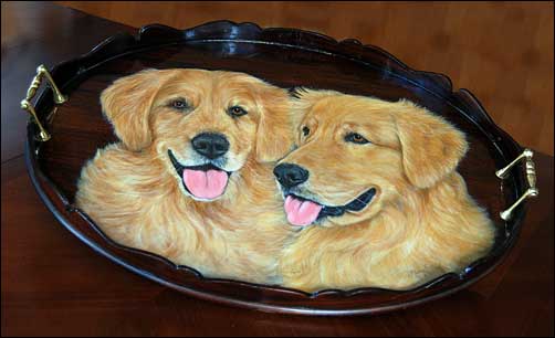 Merry offers a unique line of hand painted 24" wood trays. She will paint any breed of dog on your tray. Choose from the 50 Most Popular Breeds Merry will also paint a portrait of your animal. Please call Merry for more information. 904.814.8844 