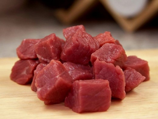 Fresh meat is good and healthy for dogs, whether cooked or raw.