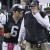 New York Jets quarterback Mark Sanchez, left, and coach Rex Ryan celebrate after the Jets scored late in the fourth quarter of an NFL football game against the Minnesota Vikings early Tuesday, Oct. 12, 2010, in East Rutherford, N.J. The Jets won 29-2