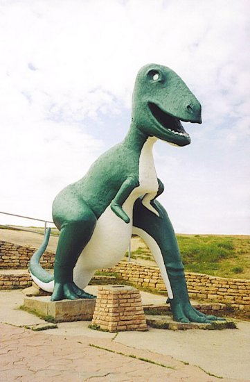 This cement dinosaur may have survived a near miss, but what about next time?
