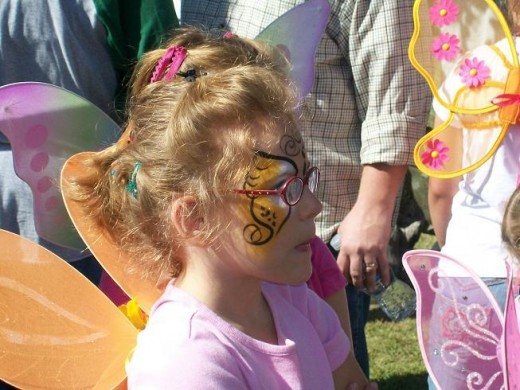 This sweet child was watching the butterfly release moment with great interest.