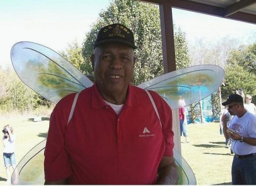 Mr. Joel Bradford of Oklahoma City, genial caretaker of the historic Jerusalem Community acres.  Note his hat, as well as wings!