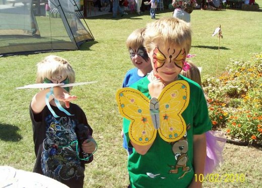 These cheerful  boys liked the ability of the butterfly to flit and bounce and look beautiful too! Each butterfly had some glow-in-the-dark paint.