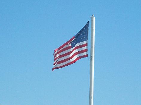 Old Glory waves in freedom in the  skies of Oklahoma.  May  it ever stand, as the butterflies wend their wings among the happy children.