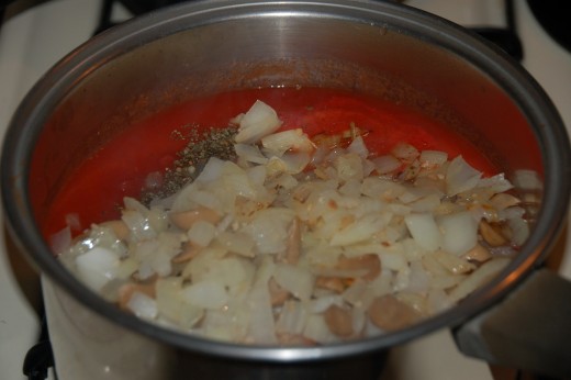 All ingredients in a pot for Creamy Cannelloni sauce, just add chicken broth, wine and cream.