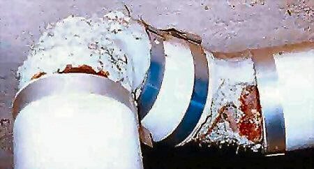 asbestos on damaged steam pipe joint