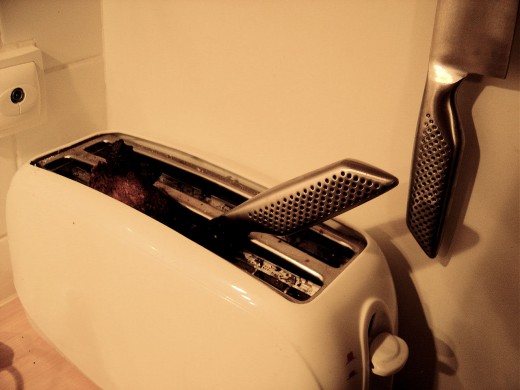 Electric shock toaster torture