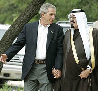 George Bush and King of Saudi Arabia holding hands. This is an unusual bromance by American standards.