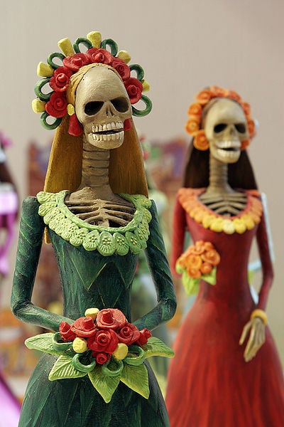 Artistic manifestations of the "Day of the Dead" in Mexico, such as altars and calavera costumes.