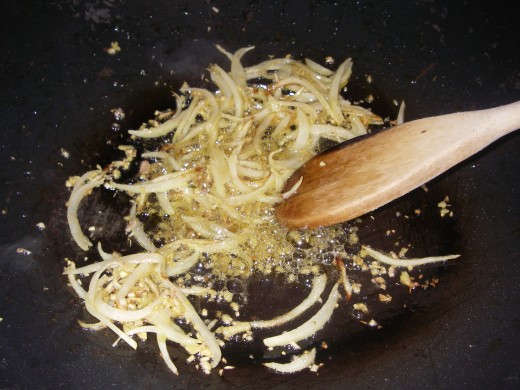 Heat sesame & vegetable oil in wok, add lemongrass, ginger & onion, saute till ingredients are soft and almost caramalised.