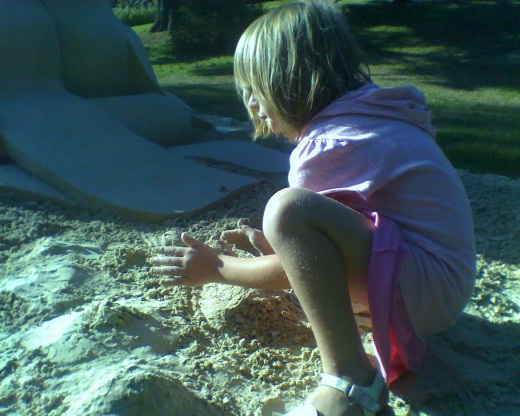 Creating a sand sculpture at DeCordova Art Museum's Sculpture Park