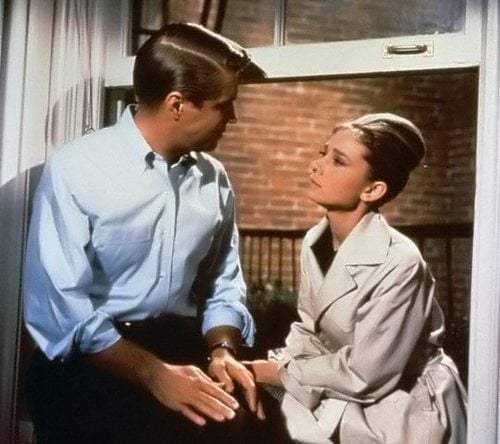 Audrey Hepburn in 'Breakfast at Tiffanys' wearing a Trench Coat