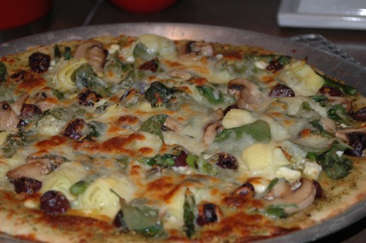 Quick and easy vegetable pizza makes a great snack or meal.
