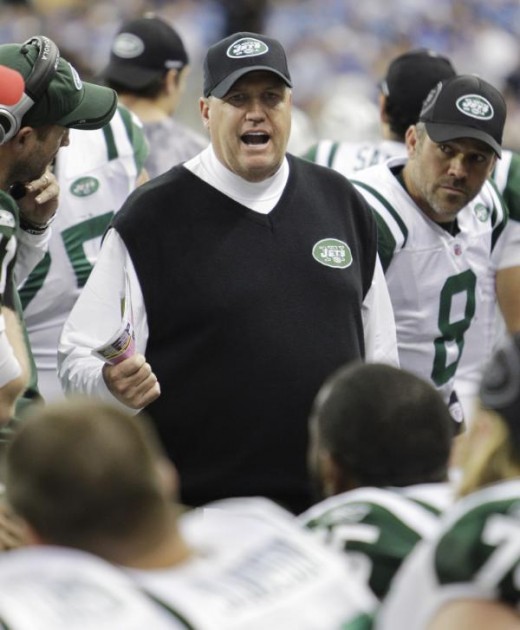 New York Jets coach Rex Ryan talks to players during the fourth quarter of an NFL football game against the Detroit Lions in Detroit on Sunday, Nov. 7, 2010. The Jets won 23-20 in overtime. (AP Photo/Paul Sancya)