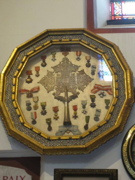 Cross surrounded by medals