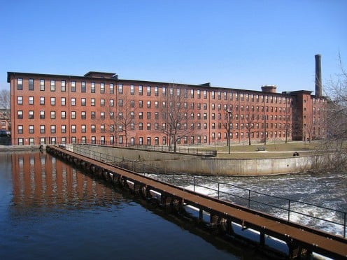 Boston Manufacturing Company mill on the Charles River, built around 1815. Many manufacturers' plant were of the same architectural style. Housing built for the mill workers was also similar and stands today. 