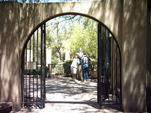 Gate at entrance to the sculptures in Tucson's Garden of Gethsemane Felix Lucero Park.