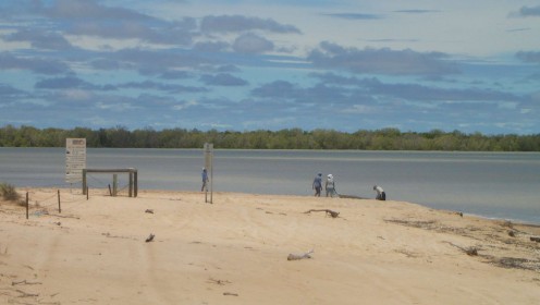 Barramundi fisherman loading a tinny