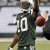 New York Jets wide receiver Santonio Holmes (10) reacts after making a catch during the third quarter of an NFL football game against the Houston Texans at New Meadowlands Stadium Sunday, Nov. 21, 2010, in East Rutherford, N.J. (AP Photo/Bill Kostrou