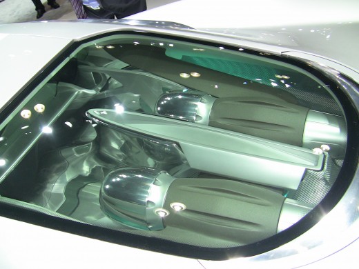 The twin, diesel powered micro turbines power a generator that recharges the battery pack which powers the four electric motors.
