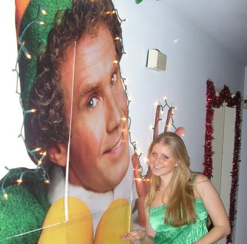 2nd PLACE - A Huge BUDDY Christmas Light Decoration on the Wall with a Huge Fan of BUDDY