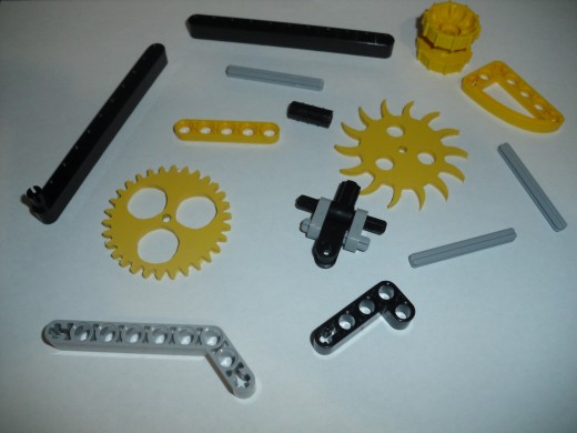 An assortment of Lego Technic parts intermixed with homemade PVC gears to help get the job done faster.