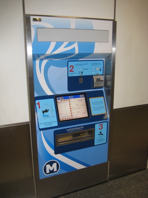 Touch screen ticket vending machine - Accepts coins and small bills - English instructions are available on the machine