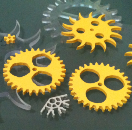 Custom gears and clock parts intended for use with K'Nex assembly parts.