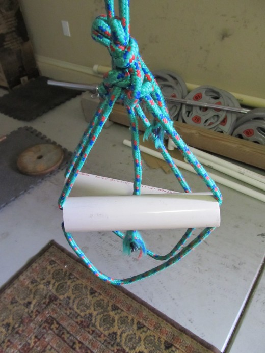 Homemade suspension trainer with 1 1/2" handles and foot 'straps.'