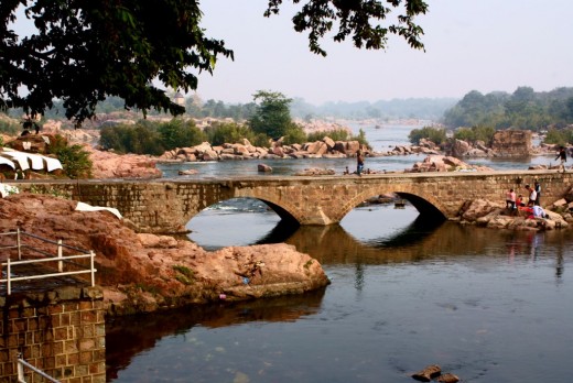 The ancient arched stone bridge on river Betwa