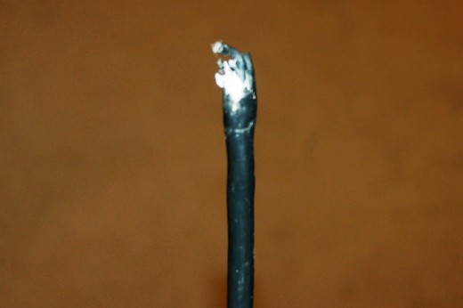 This is a poor, closeup picture of the chewed wire.  The plug was completely shot. This is a poor, closeup picture of the chewed wire.  The plug was completely shot.