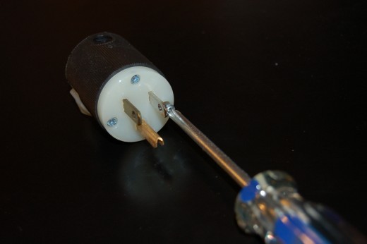 Start by loosening the front screws.  The white piece should pop out with ease. Start by loosening the front screws.  The white piece should pop out with ease.